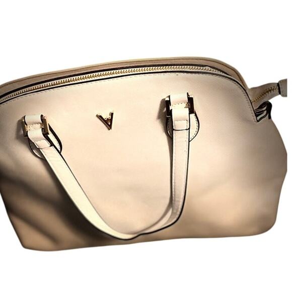 Large Beige Handbag.  Feet on bottom, textured surface.  Dome shape crossbody - Picture 3 of 8